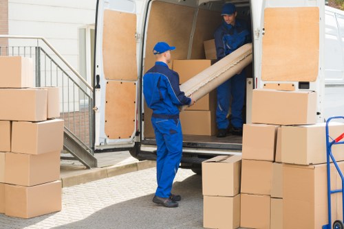 Removal team preparing a Bermondsey home move with boxes and furniture