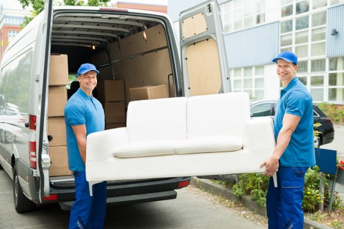Team members reviewing ethical labour standards for a Bermondsey removal company