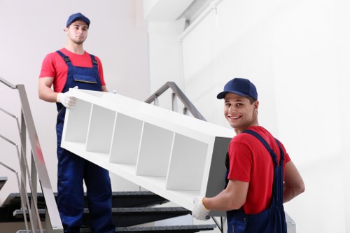 Removal team loading household items during a scheduled move