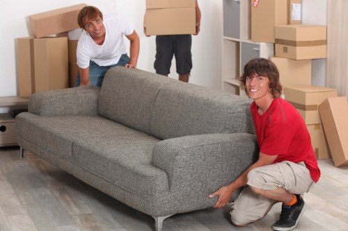 Professional movers transporting office furniture in Bermondsey
